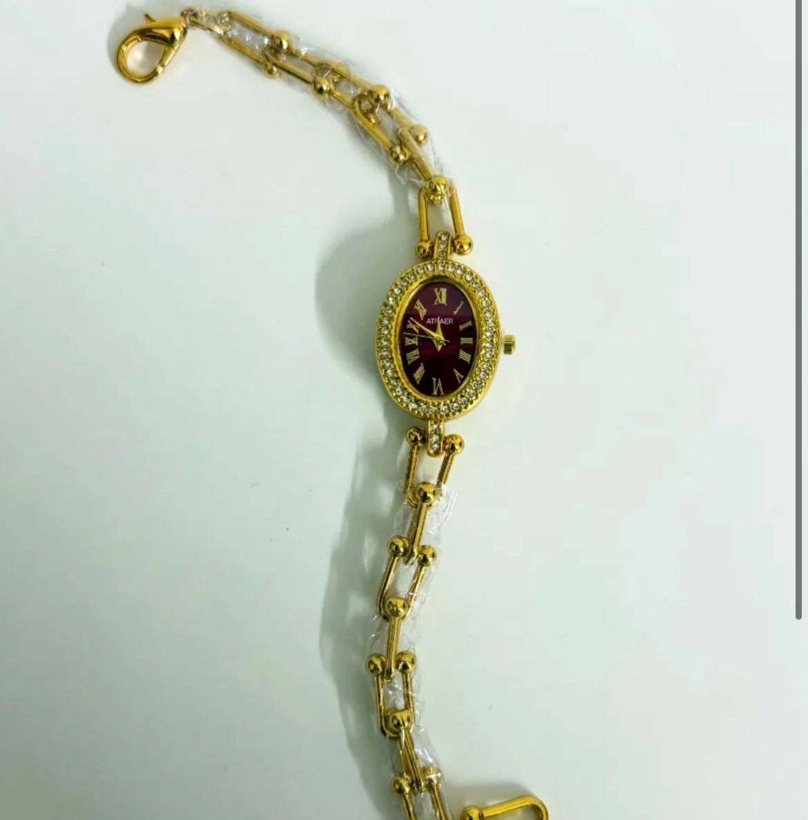Oval dial (maroon) 1