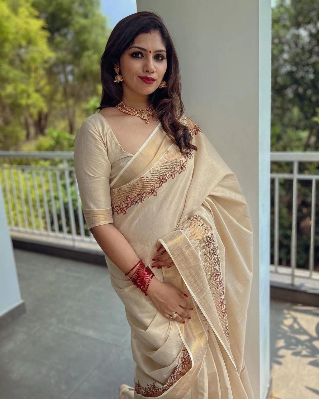 Kerala Tissue embroidered Saree 6