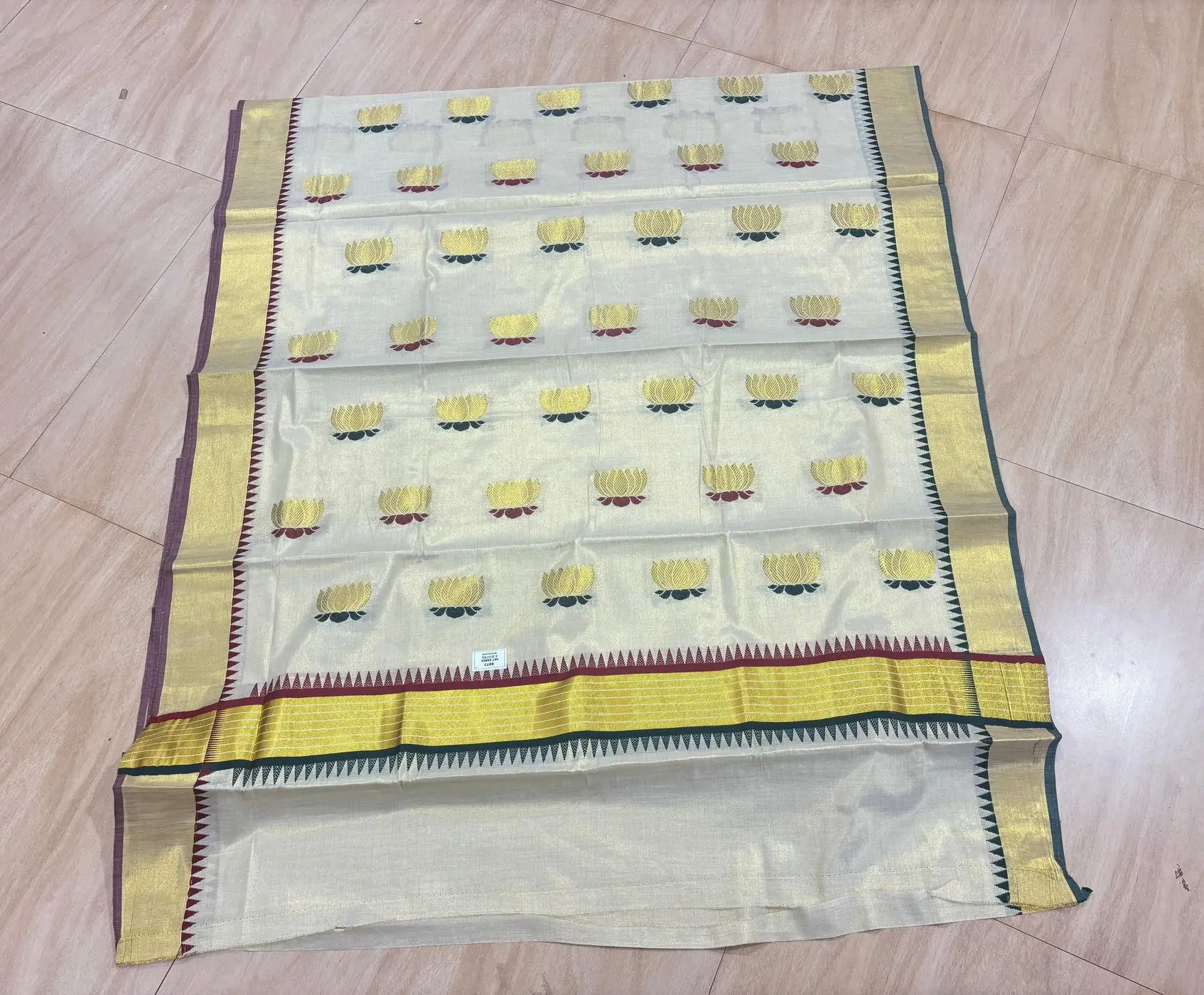 Kerala Kasavu Tissue Saree with Lotus weave 1