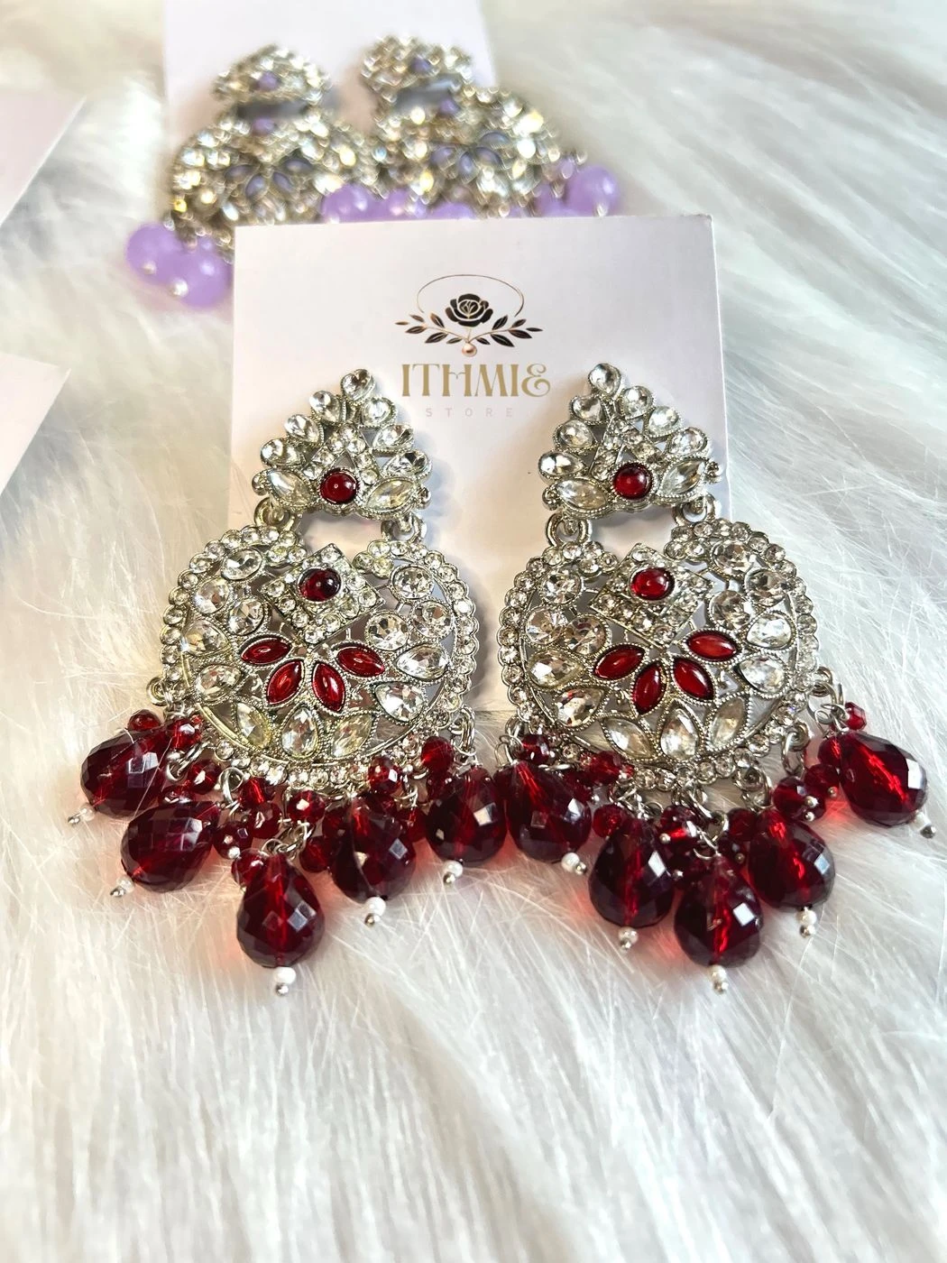 Ruby Red & Silver Radiating ruby sparkle with luxurious statement elegance.