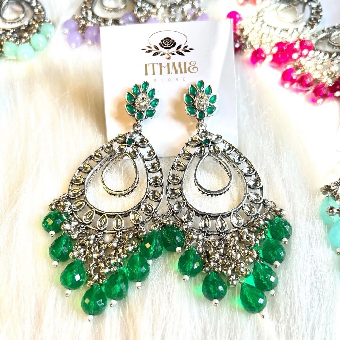 Emerald Green & Silver Vibrant emerald elegance crafted for timeless glamour.