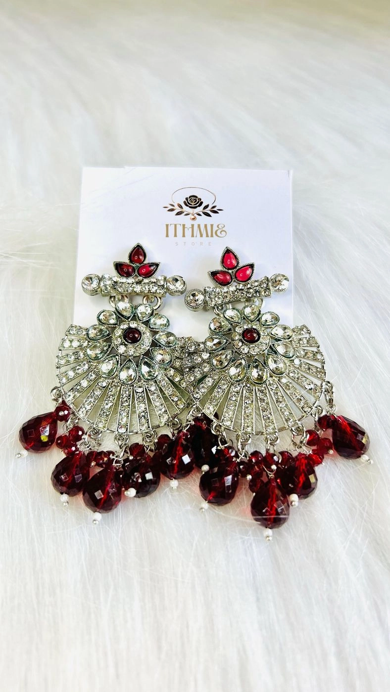 Ruby Red & Silver A touch of ruby, a statement of elegance.