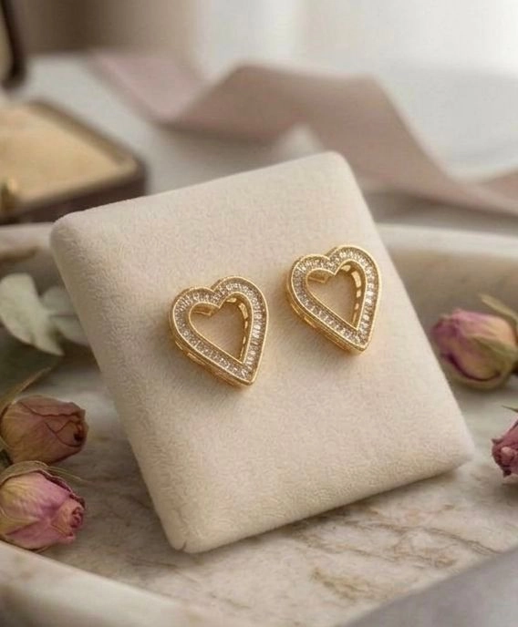 Heart-shaped stud earrings.