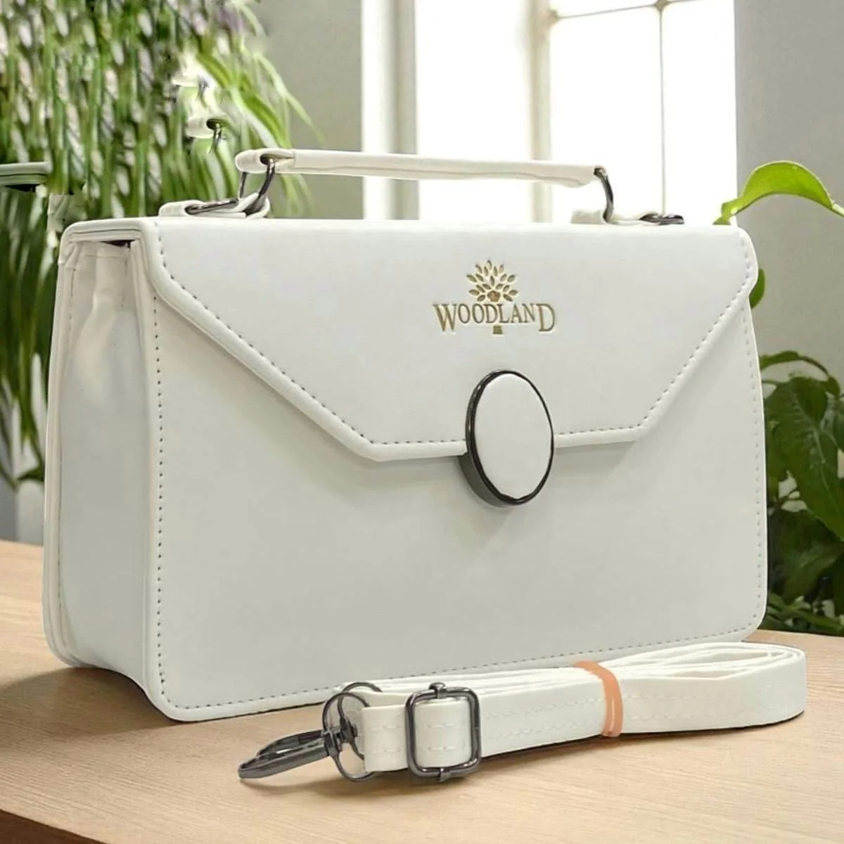 Ivory sling bag
