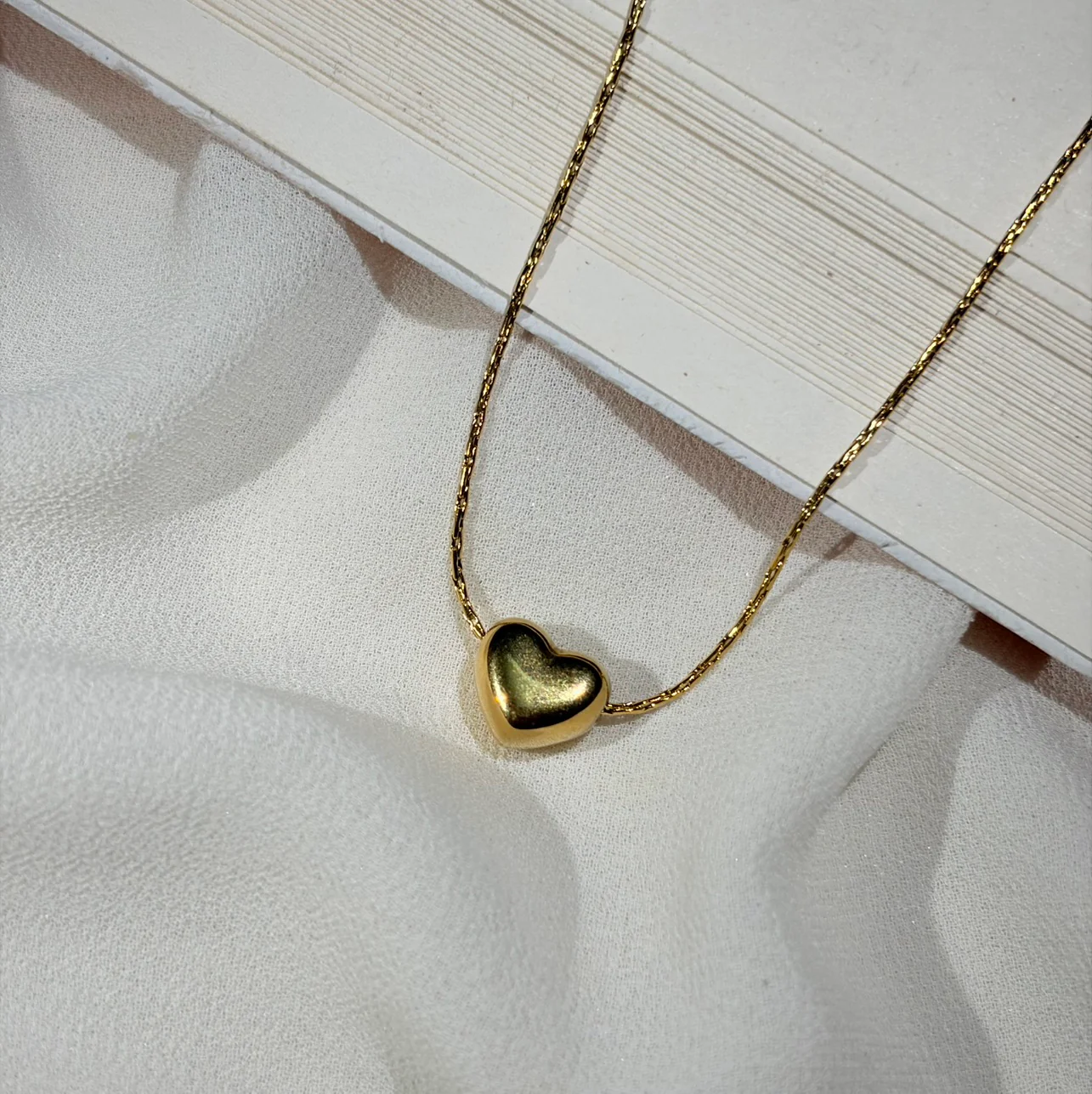Golden heart pendant