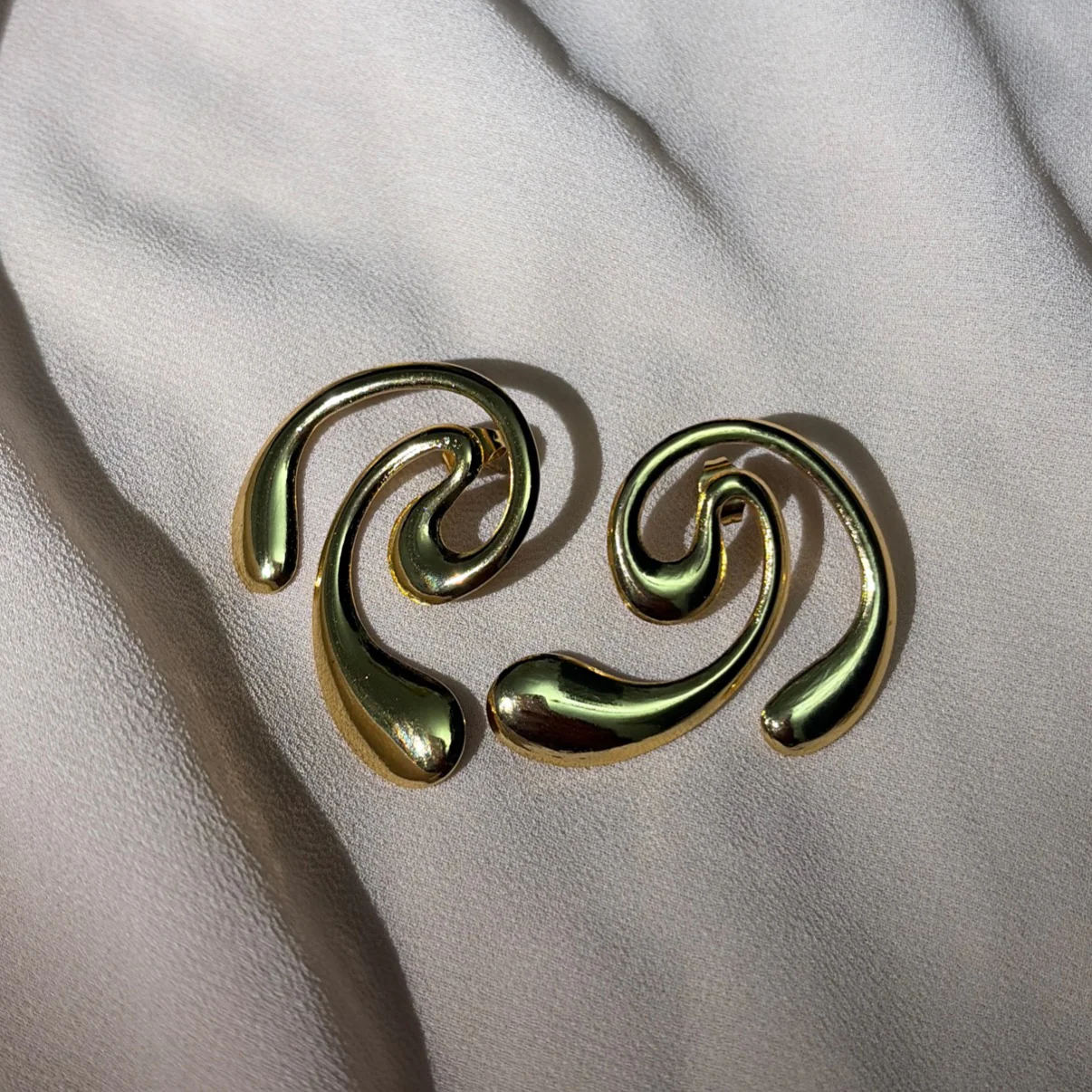 Golden wave earring