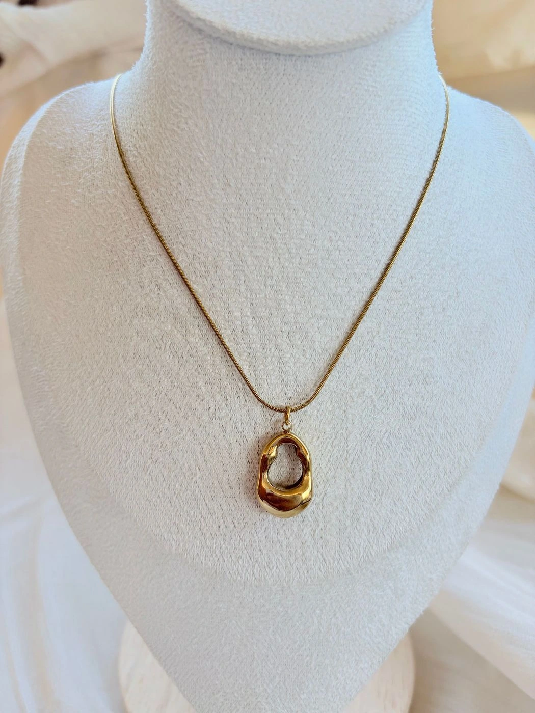 Golden aura pendant