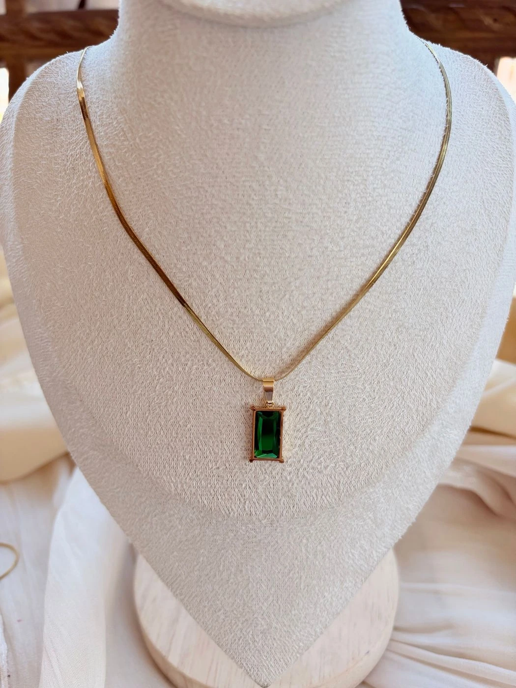 Emerald green stone pendant