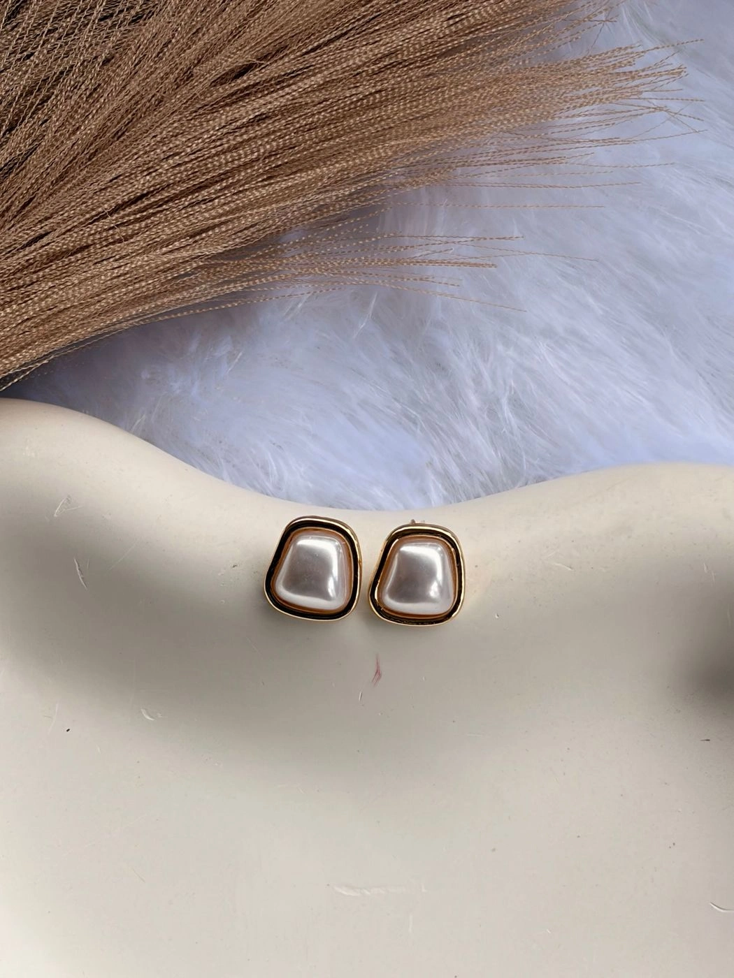 White pearl earring