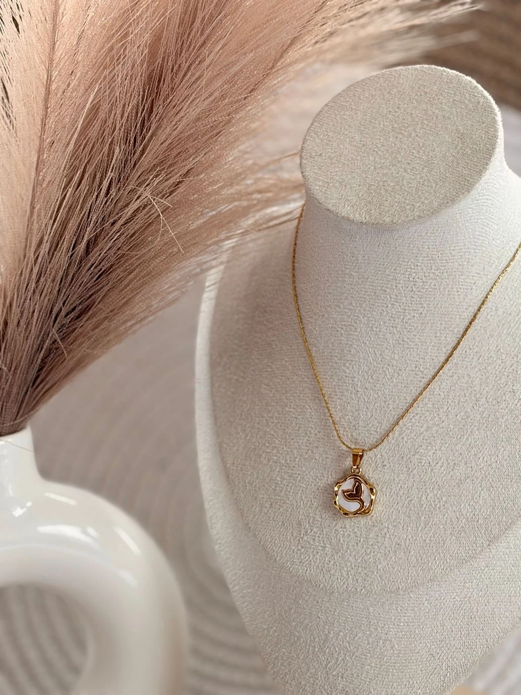 Fish tail pendant