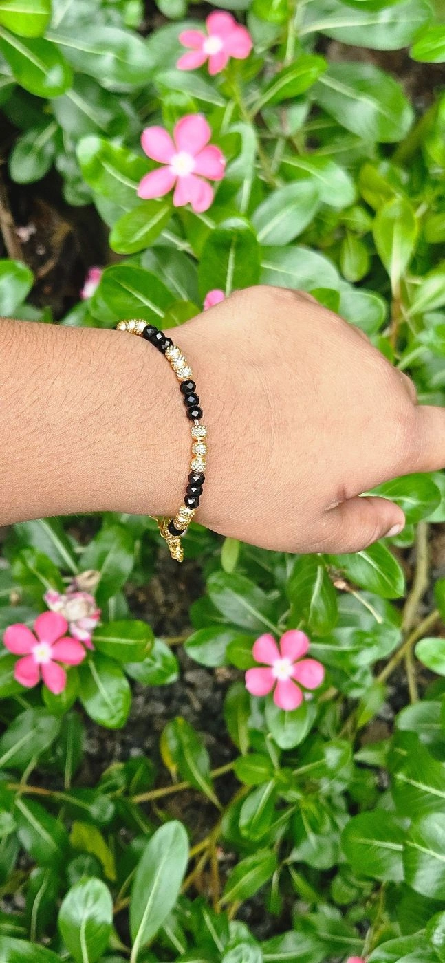 3 karimani with golden kids bracelet