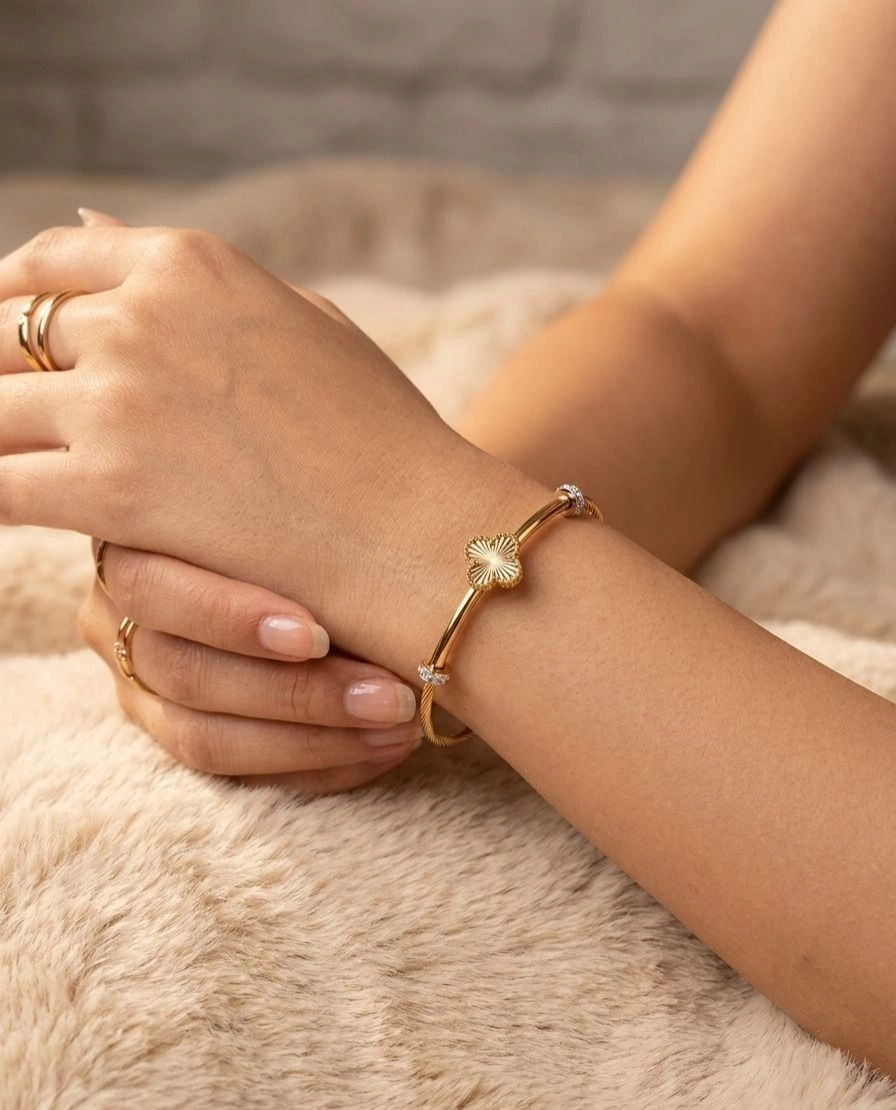 Gold cuff-style bangle 1