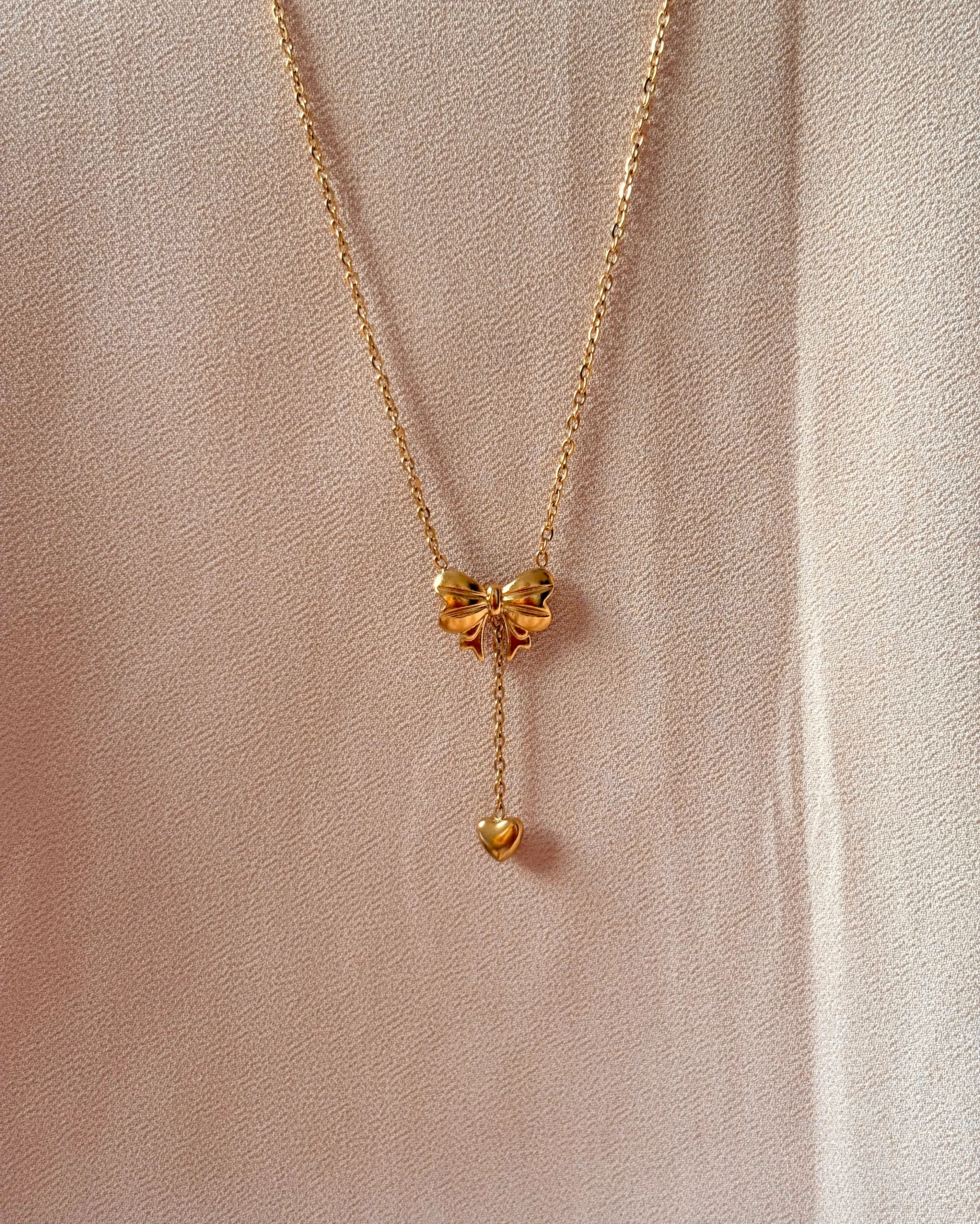 Bow and heart hanging necklace 2
