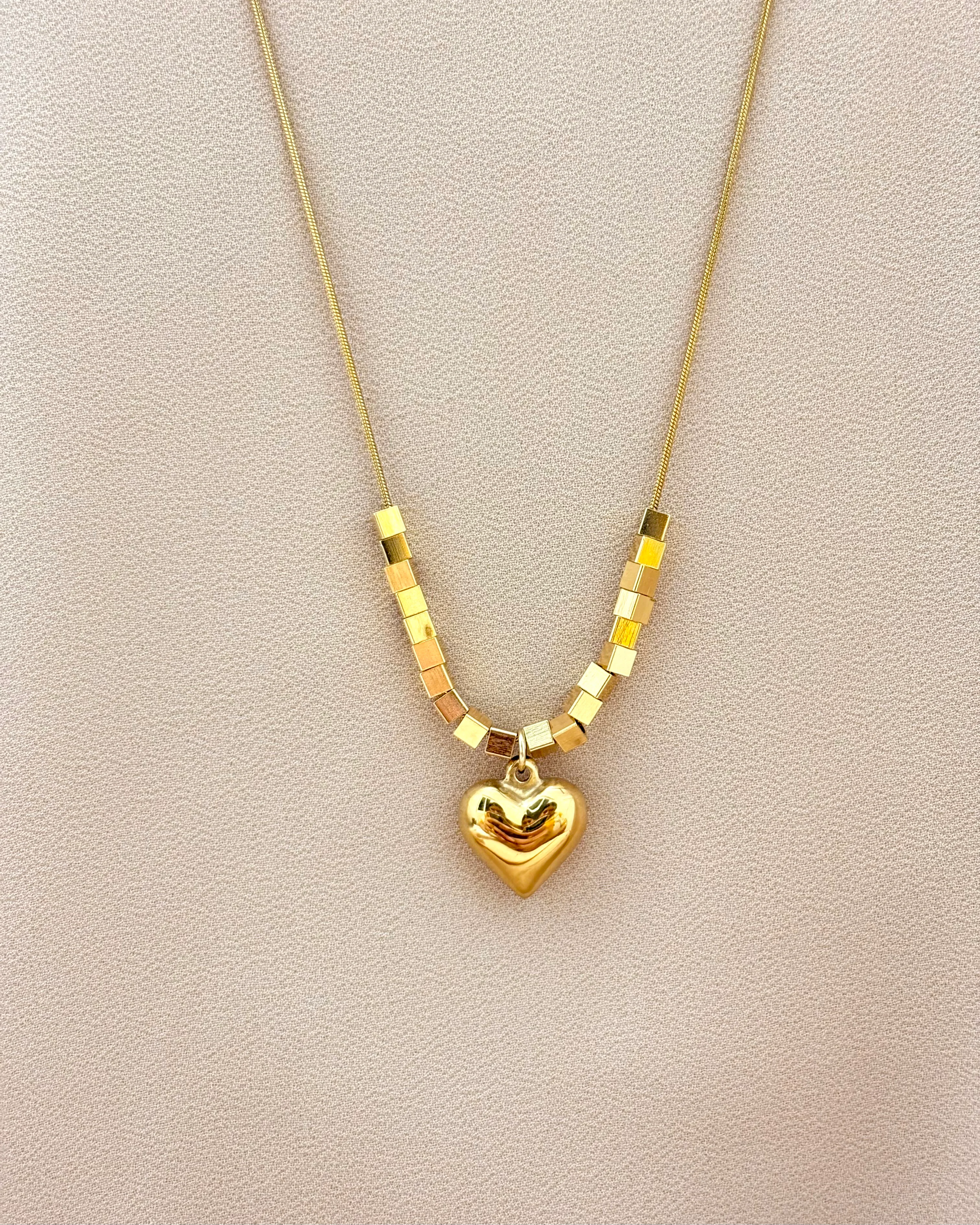 Heart themed Pendant necklace with square beads
