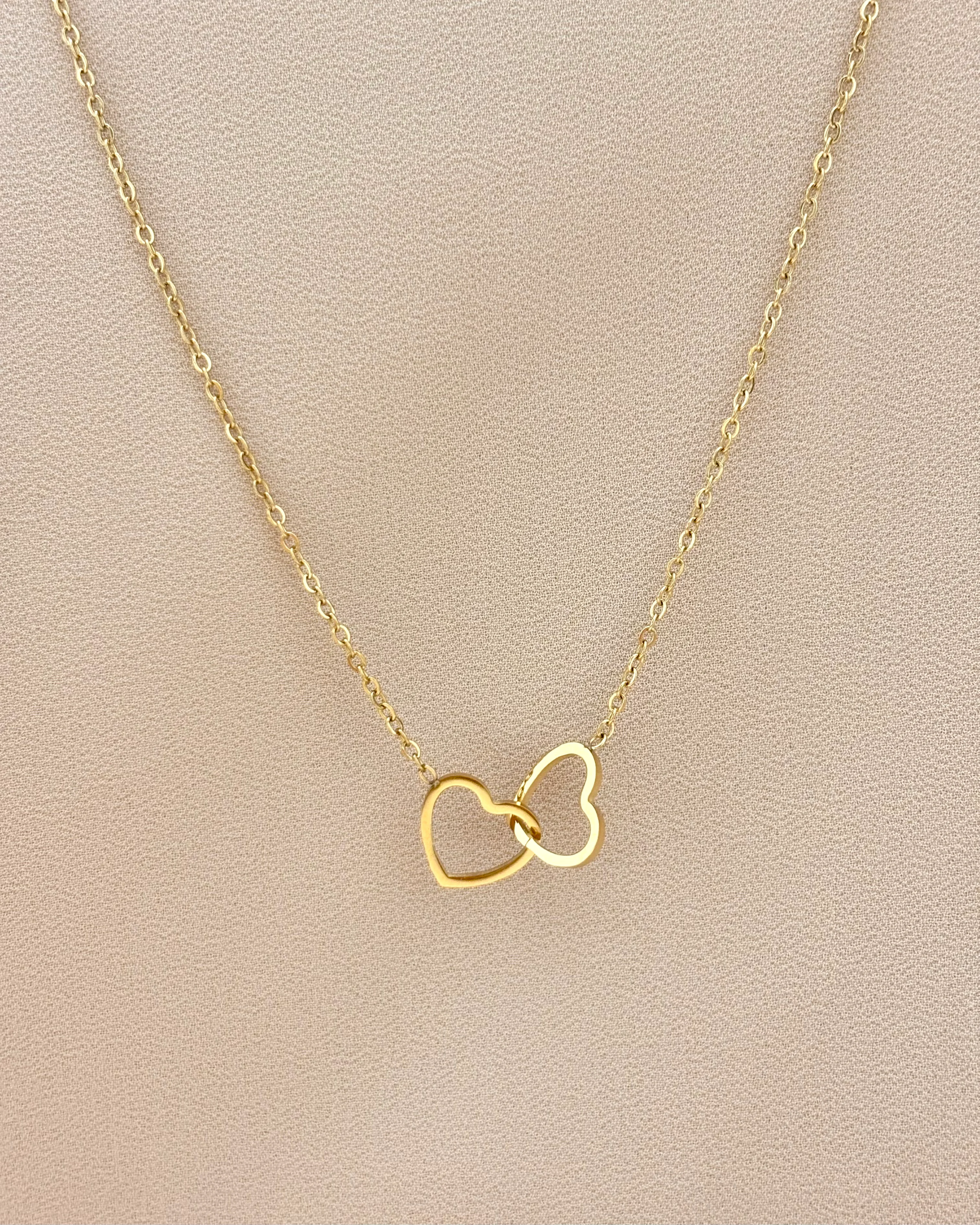 Two hearts connected pendant necklace 1