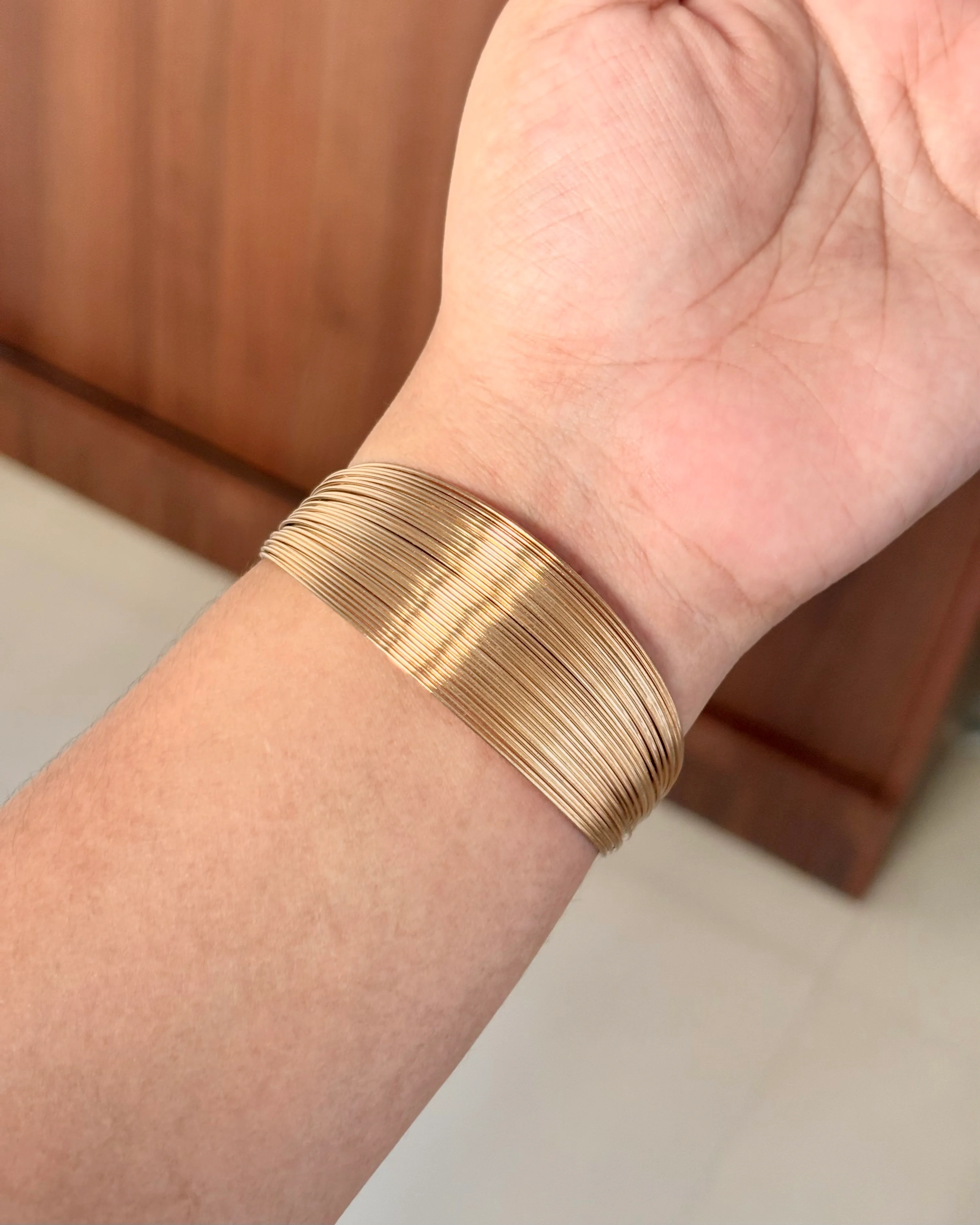 Multi line cuff bracelet