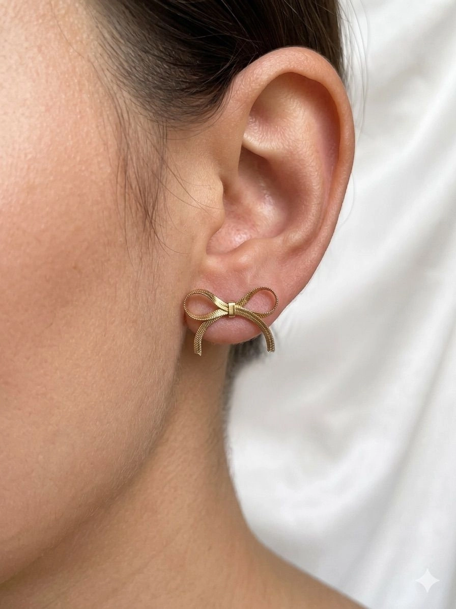 Bow themed drop earrings