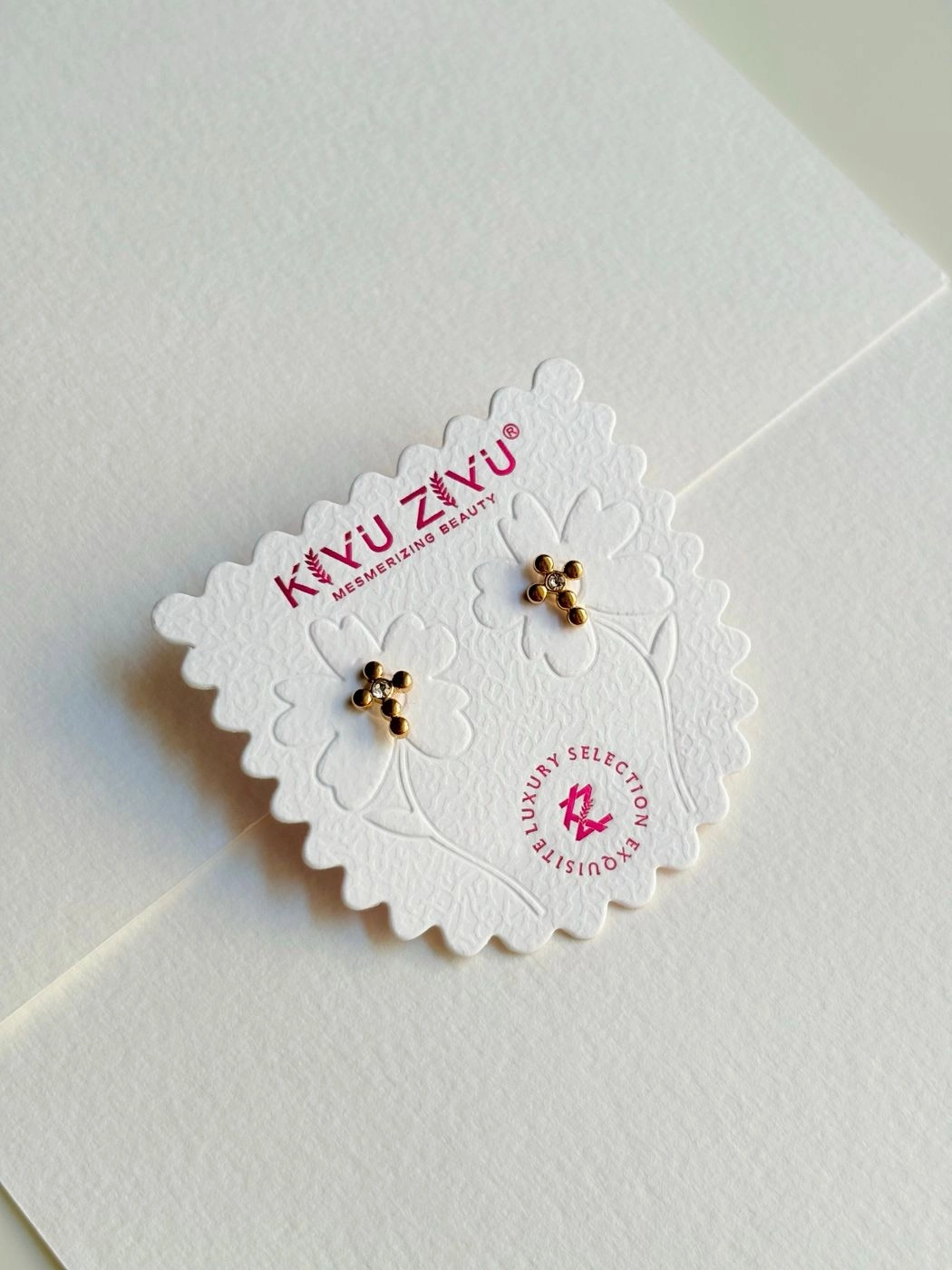 Dotted cross ball back earrings