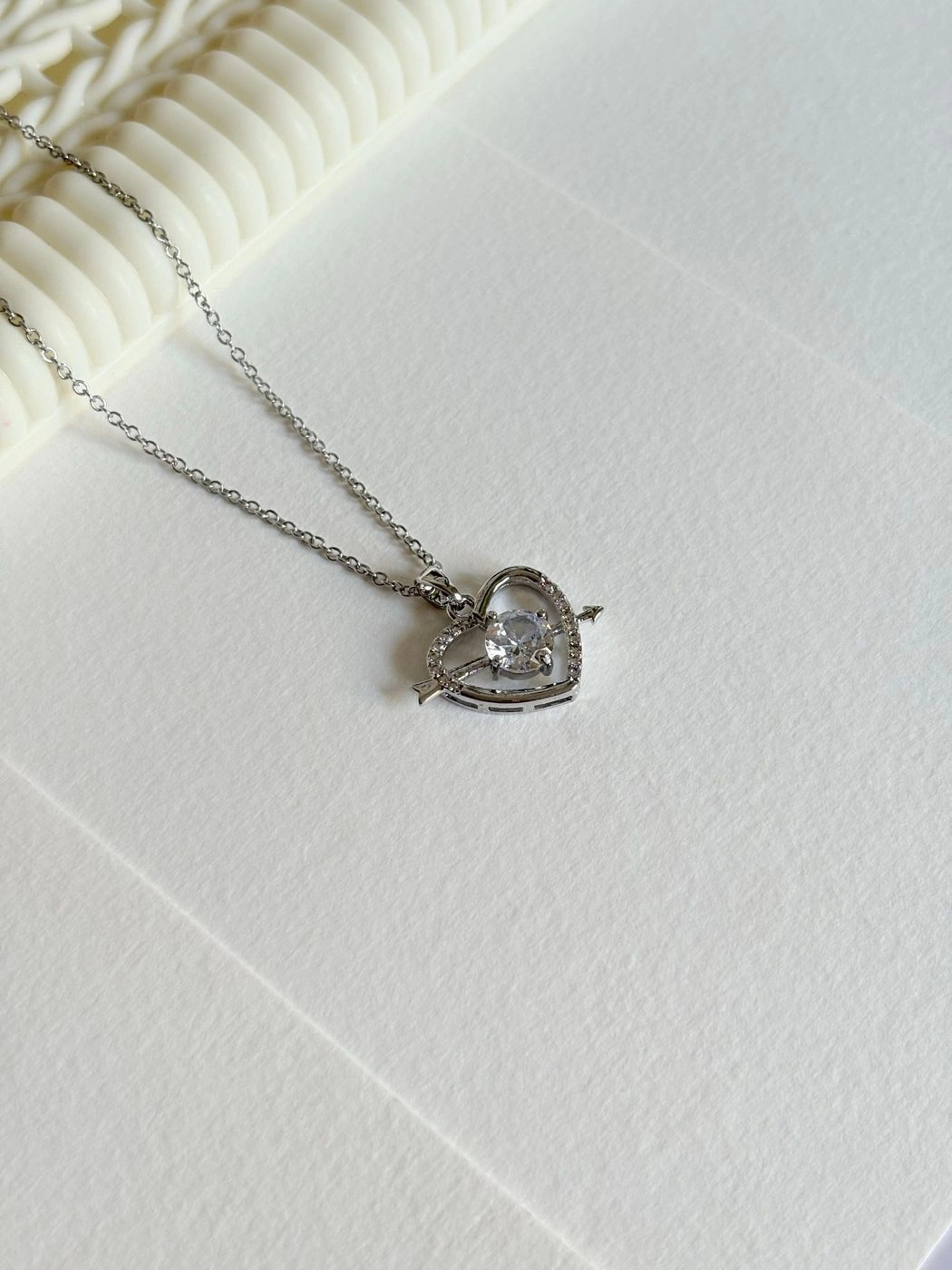 Arrow in heart pendant chain