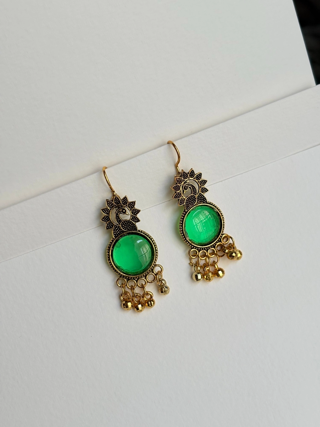 Golden peacock earrings 4