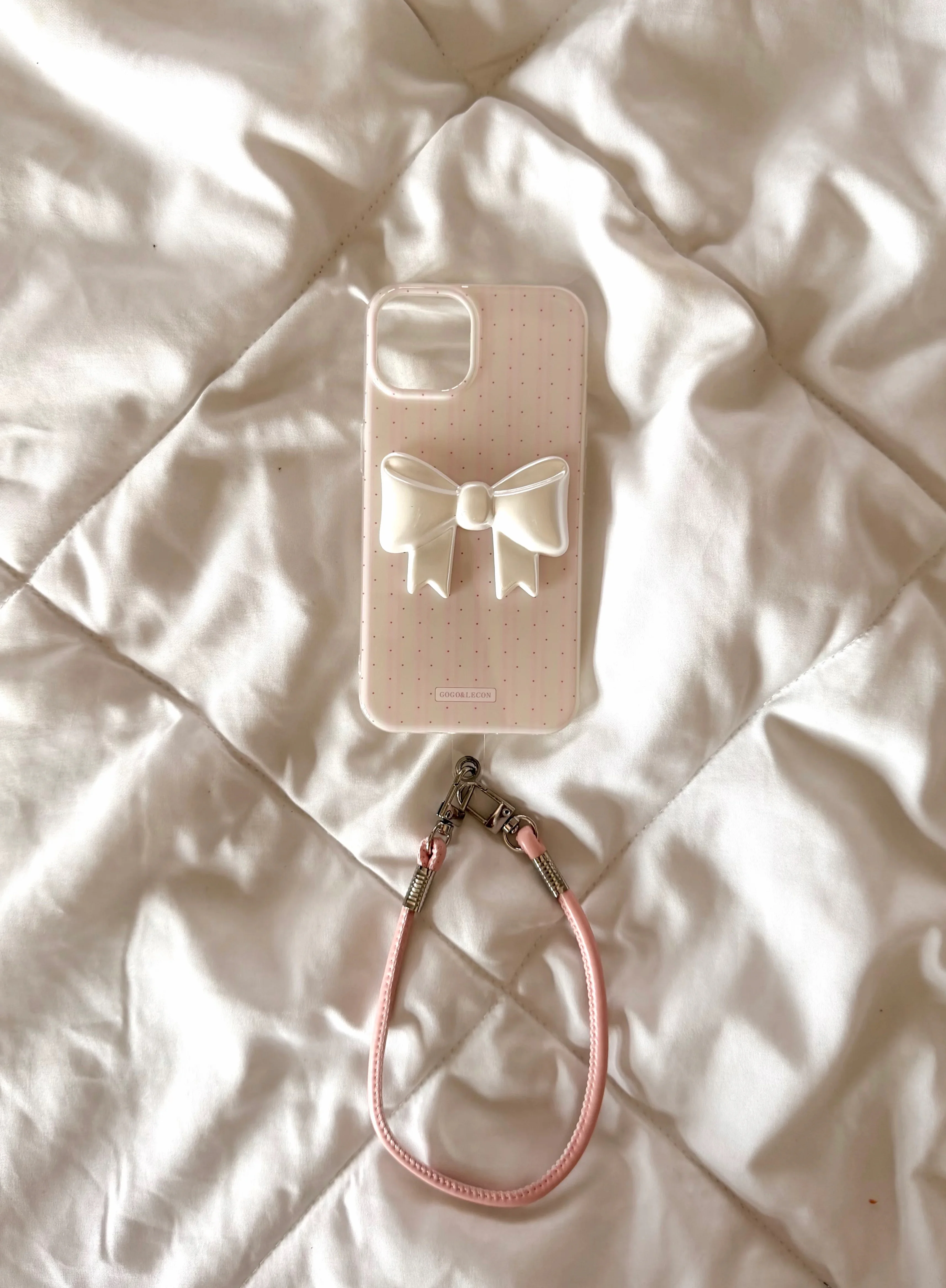 Pink striped phone case with 3D white bow & wrist strap