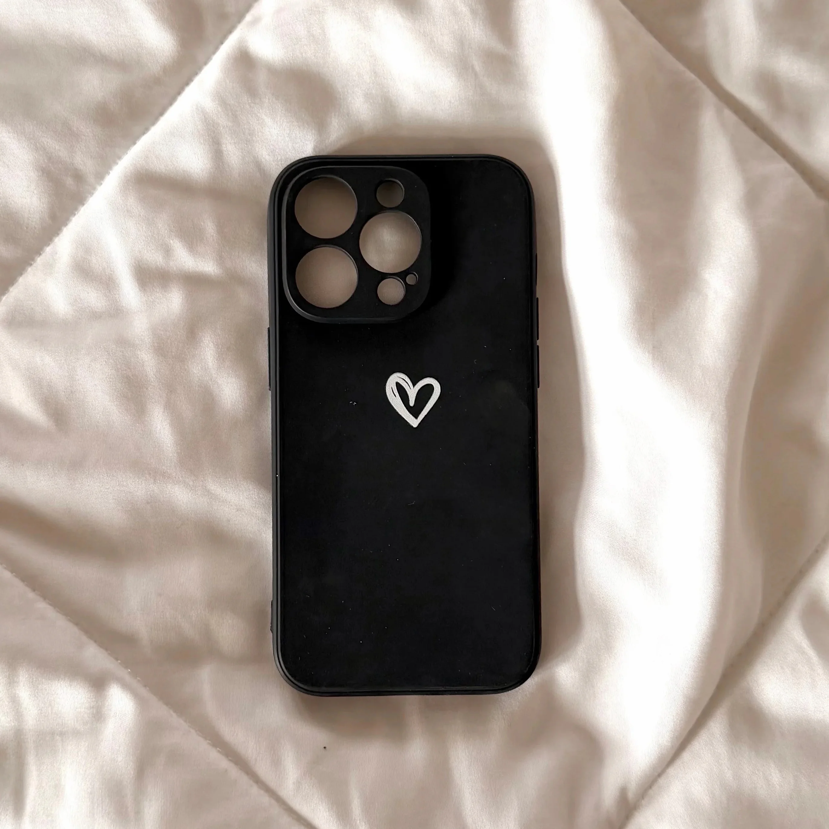 Black silicone case with white heart