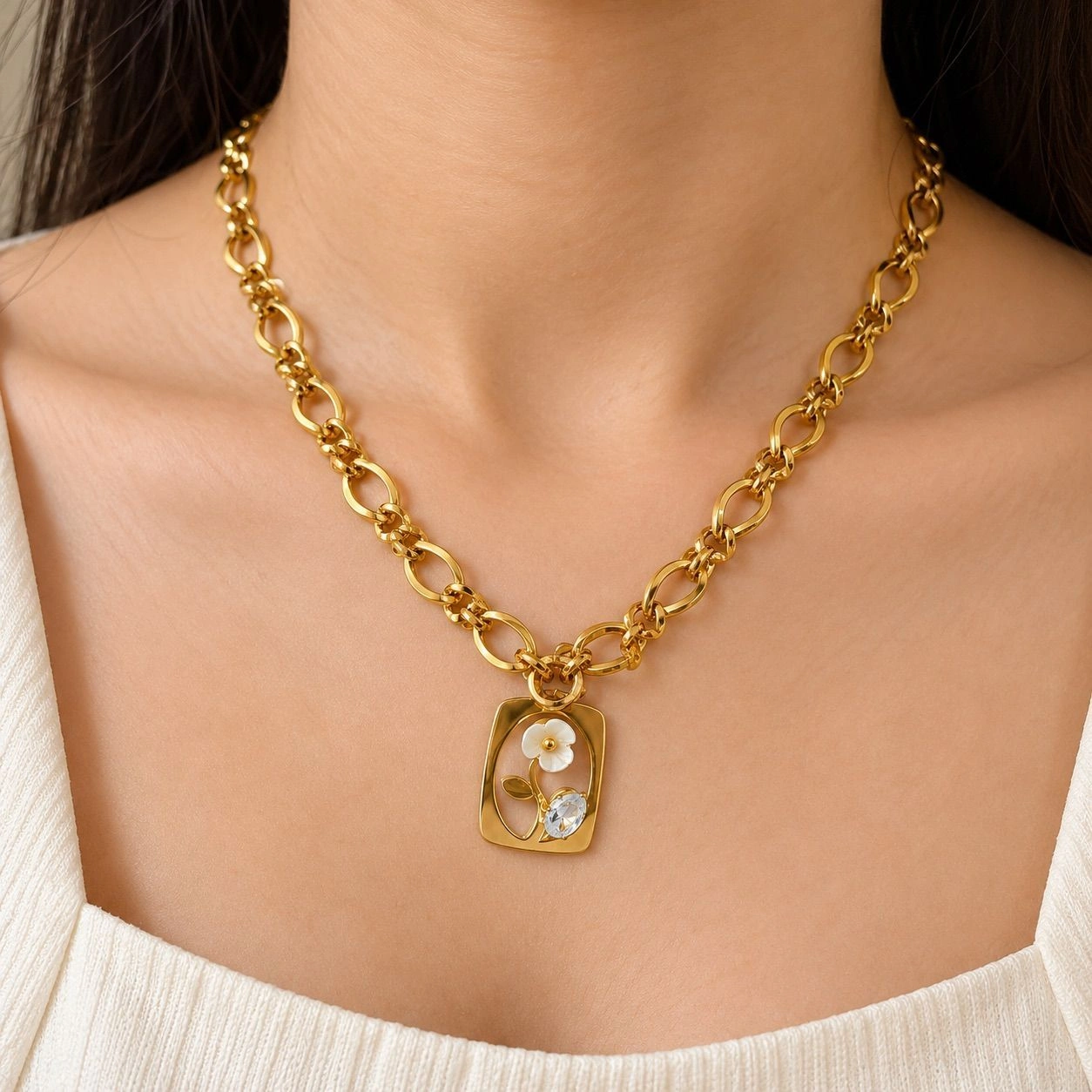 NECKLACE WITH A RECTANGULAR PENDANT HIGHLIGHTED WITH A WHITE FLOWER 1