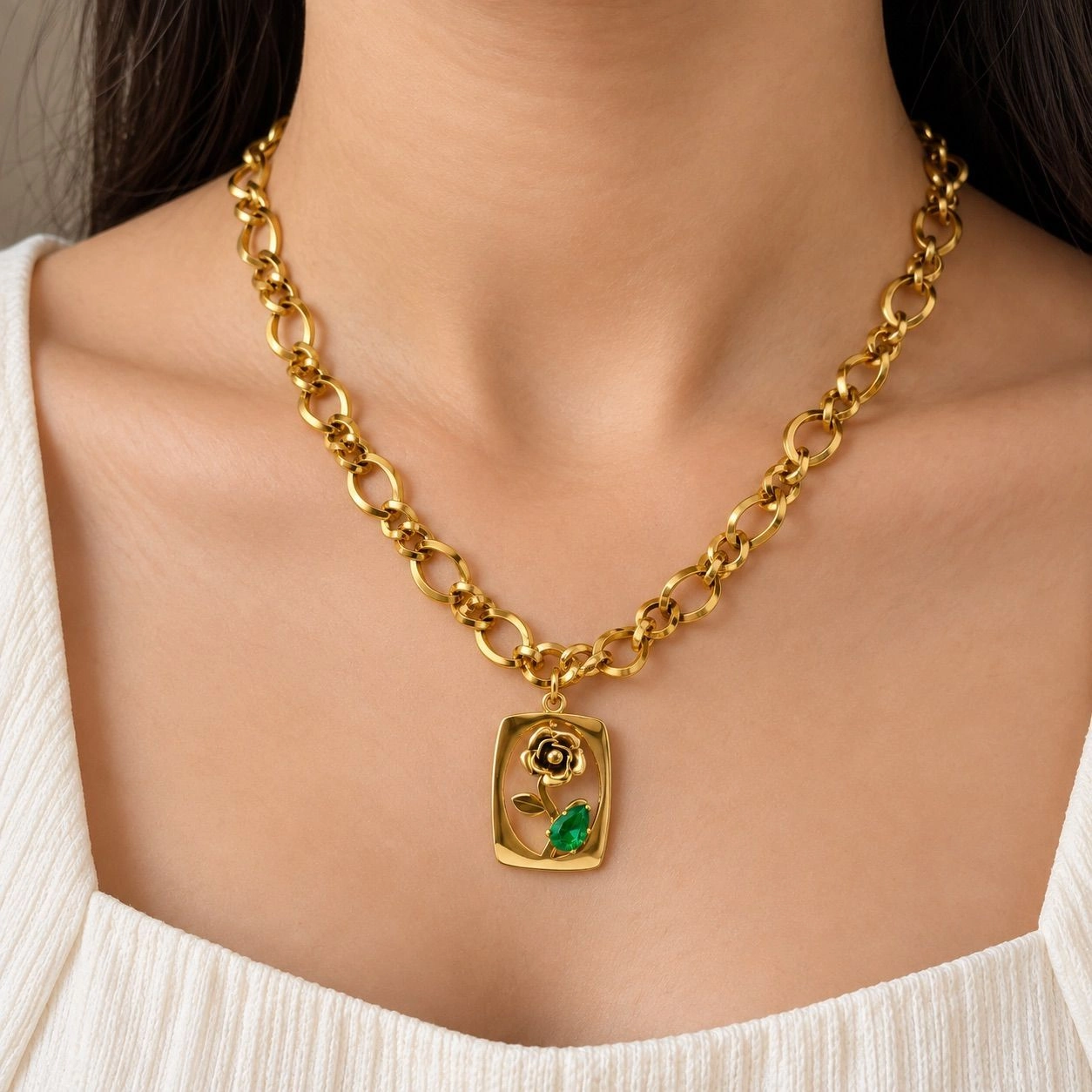 NECKLACE WITH A RECTANGULAR PENDANT HIGHLIGHTED WITH A GOLDEN FLOWER 1