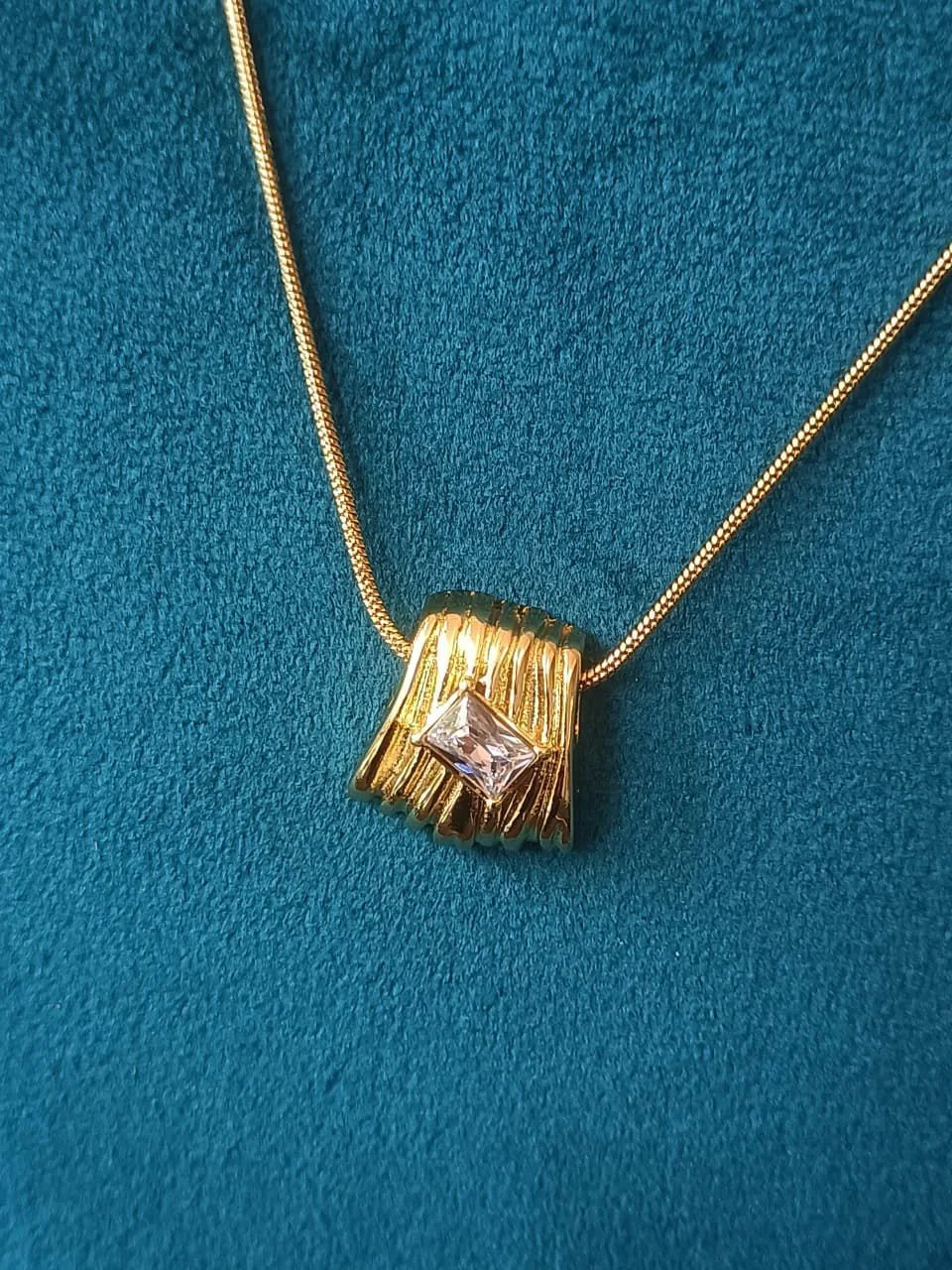 Sculpted step pendent 1