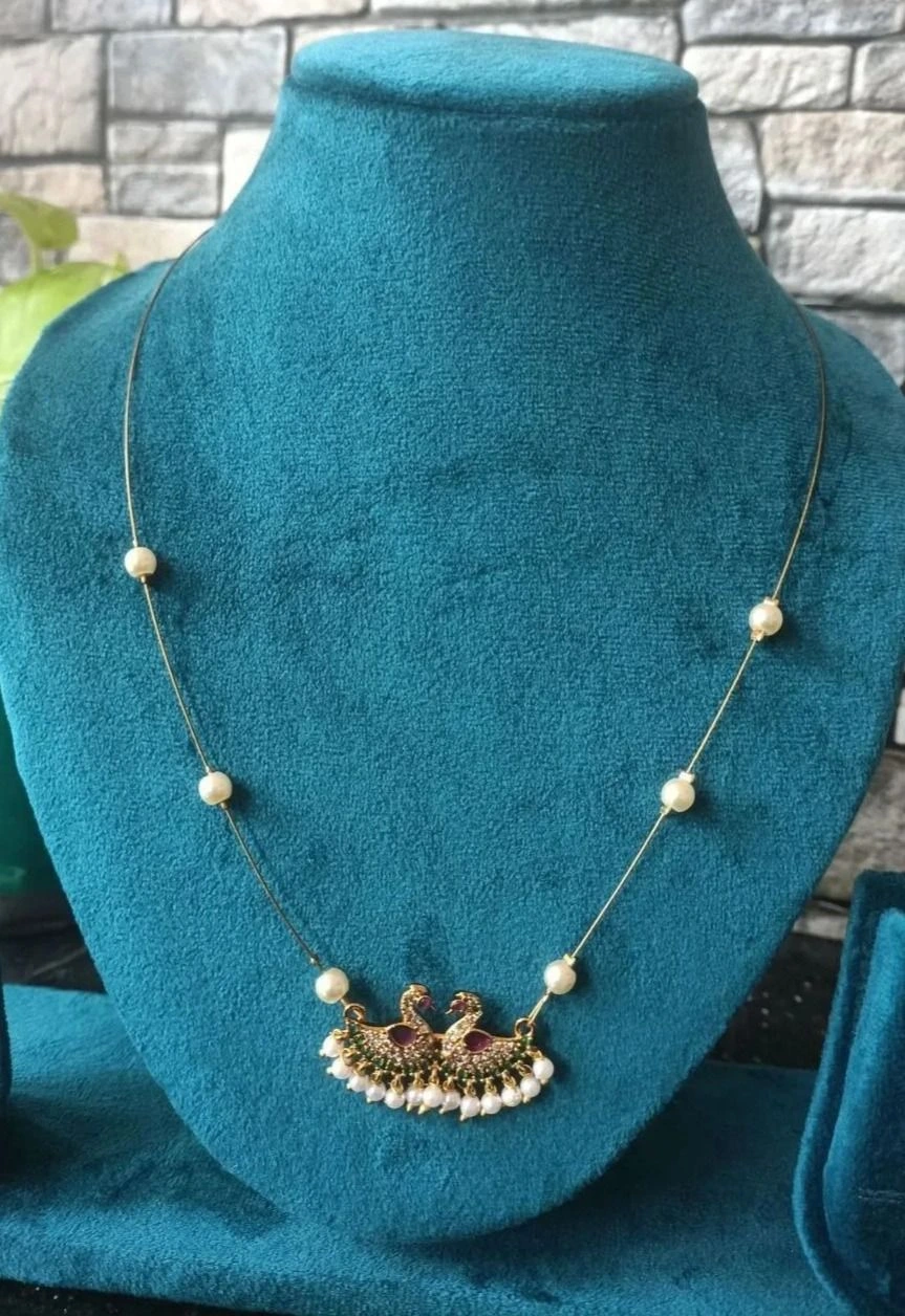 Twin swan motif necklace