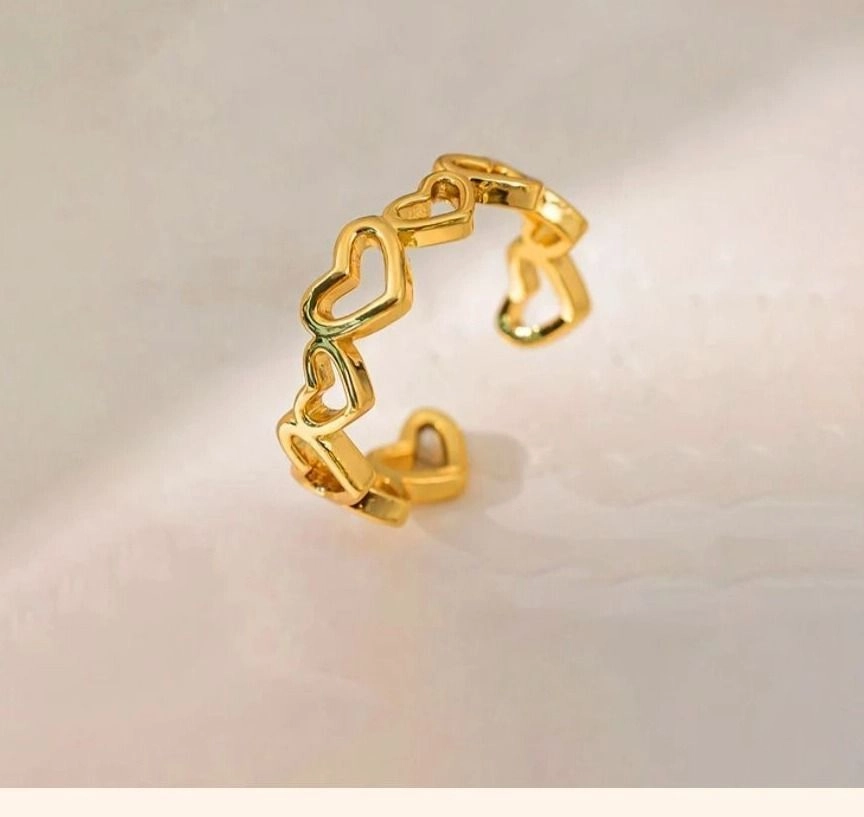Heart themed adjustable ring