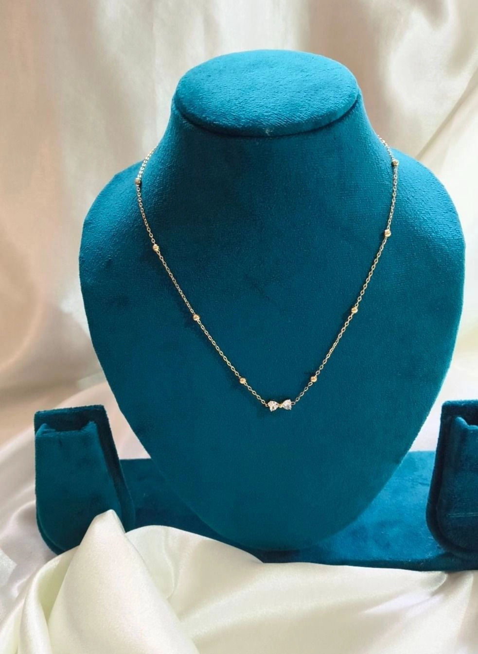 White stone Bow pendant