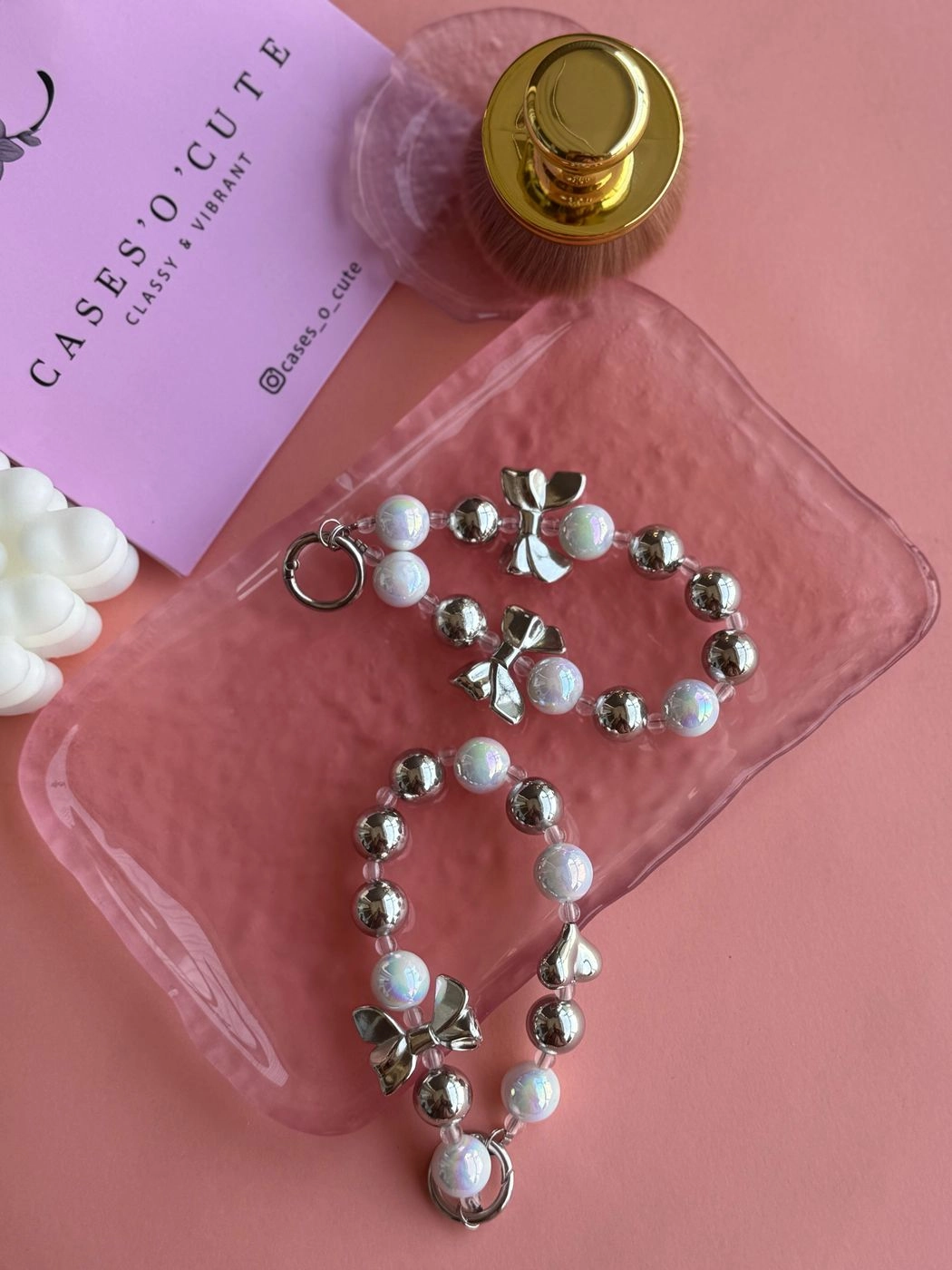 Silver bow bead