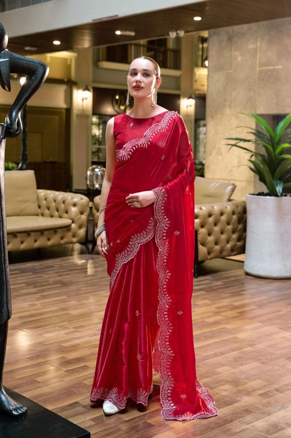 Red fancy shimmer chiffon saree with embroidery work Red fancy