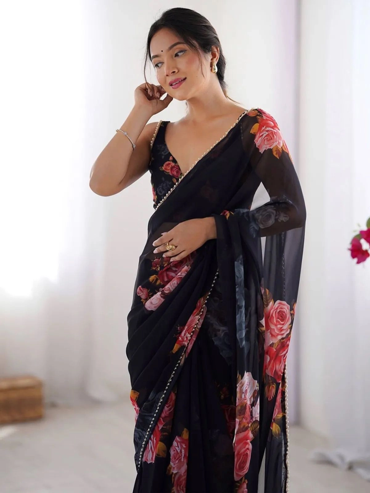 Black color georgette saree with printed work and moti border 2