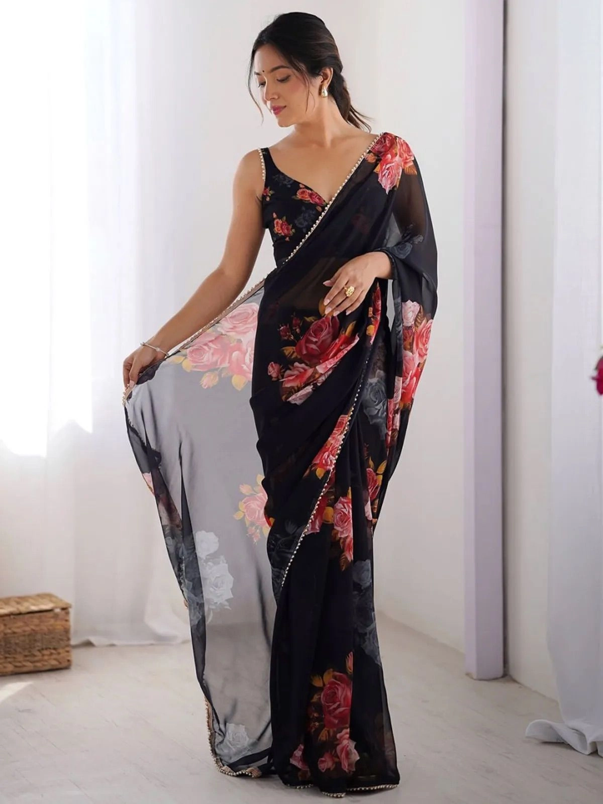 Black color georgette saree with printed work and moti border 3