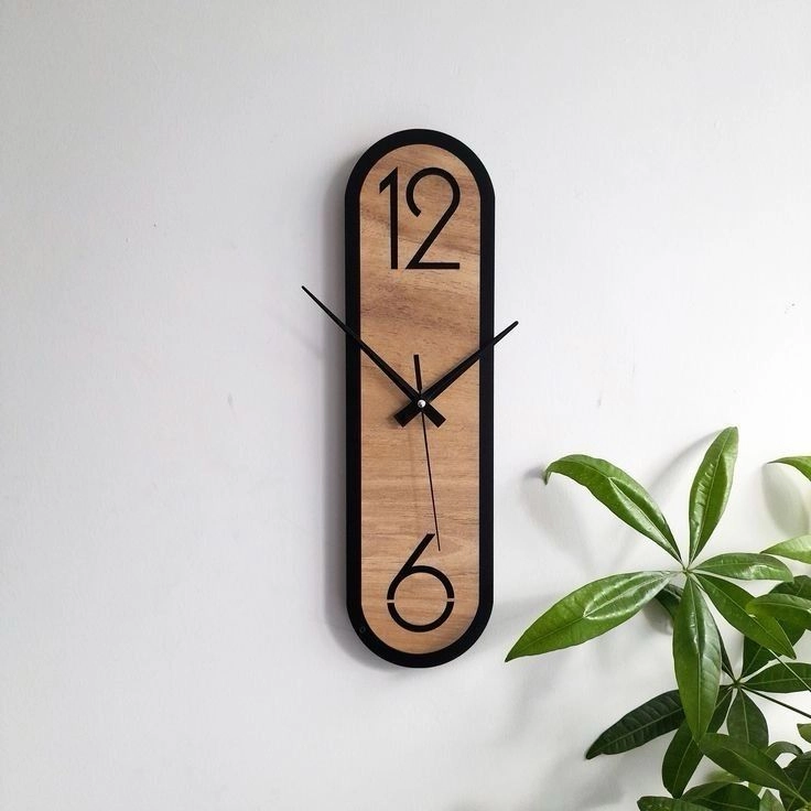 Oval wall clock