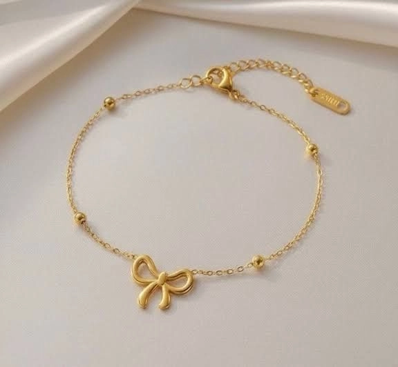 Golden Bow Charm Bracelet 1