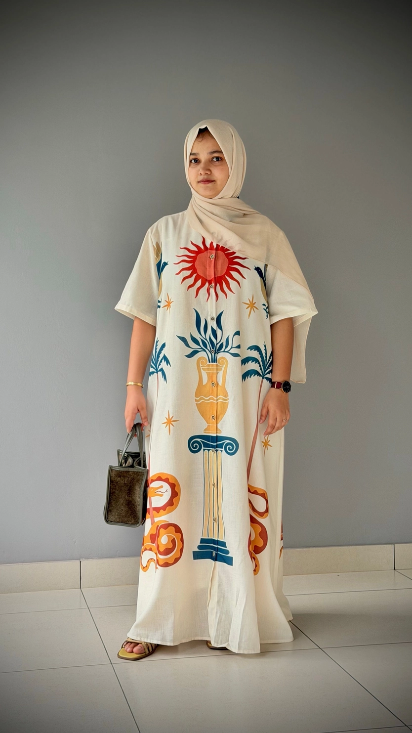 The Solara Ivory Maxi Dress