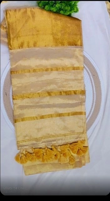 Gold mul tissue saree