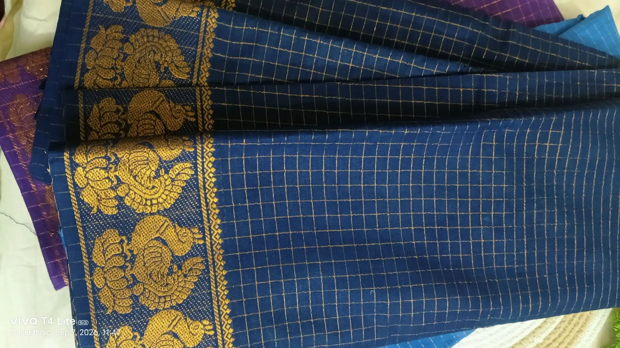 Sungudi kattam saree with peacock border navy blue 1