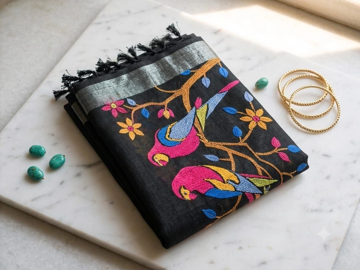 Premium, breathable charcoal-black linen with a rich natural texture saree