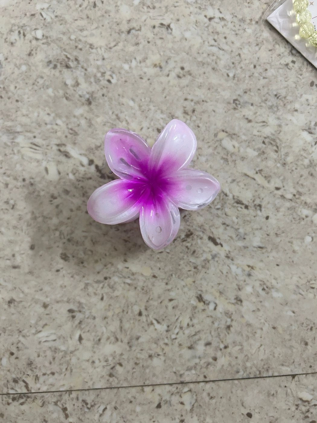 Purple shaded daisy clawclip