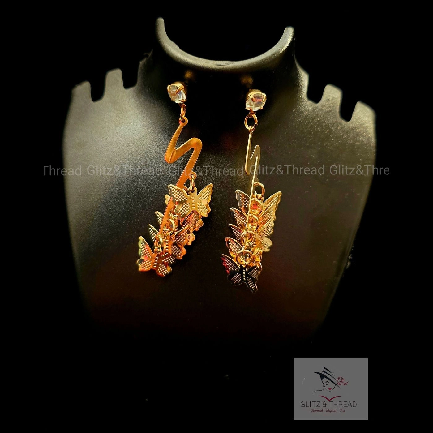 Wavy Dangling Earring With Butterfly