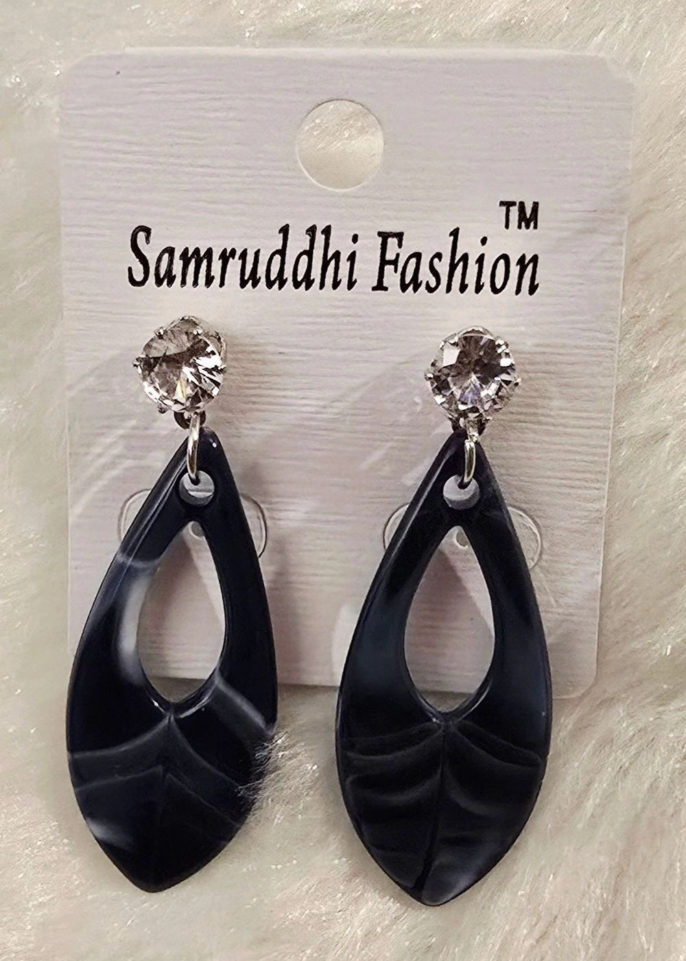 Elegant hollow teardrop statement design 2