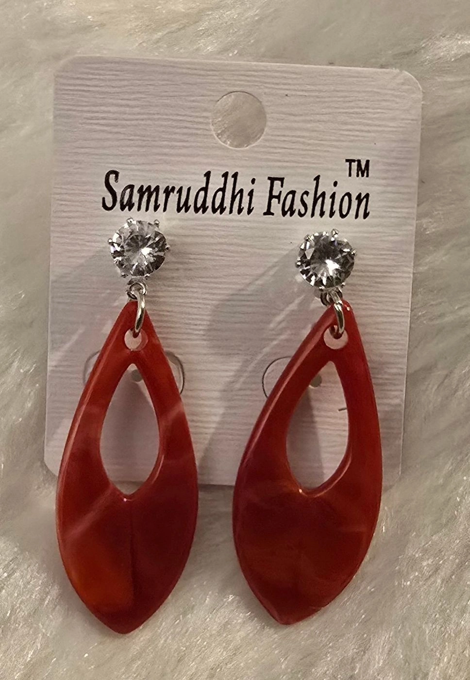 Elegant hollow teardrop statement design 8