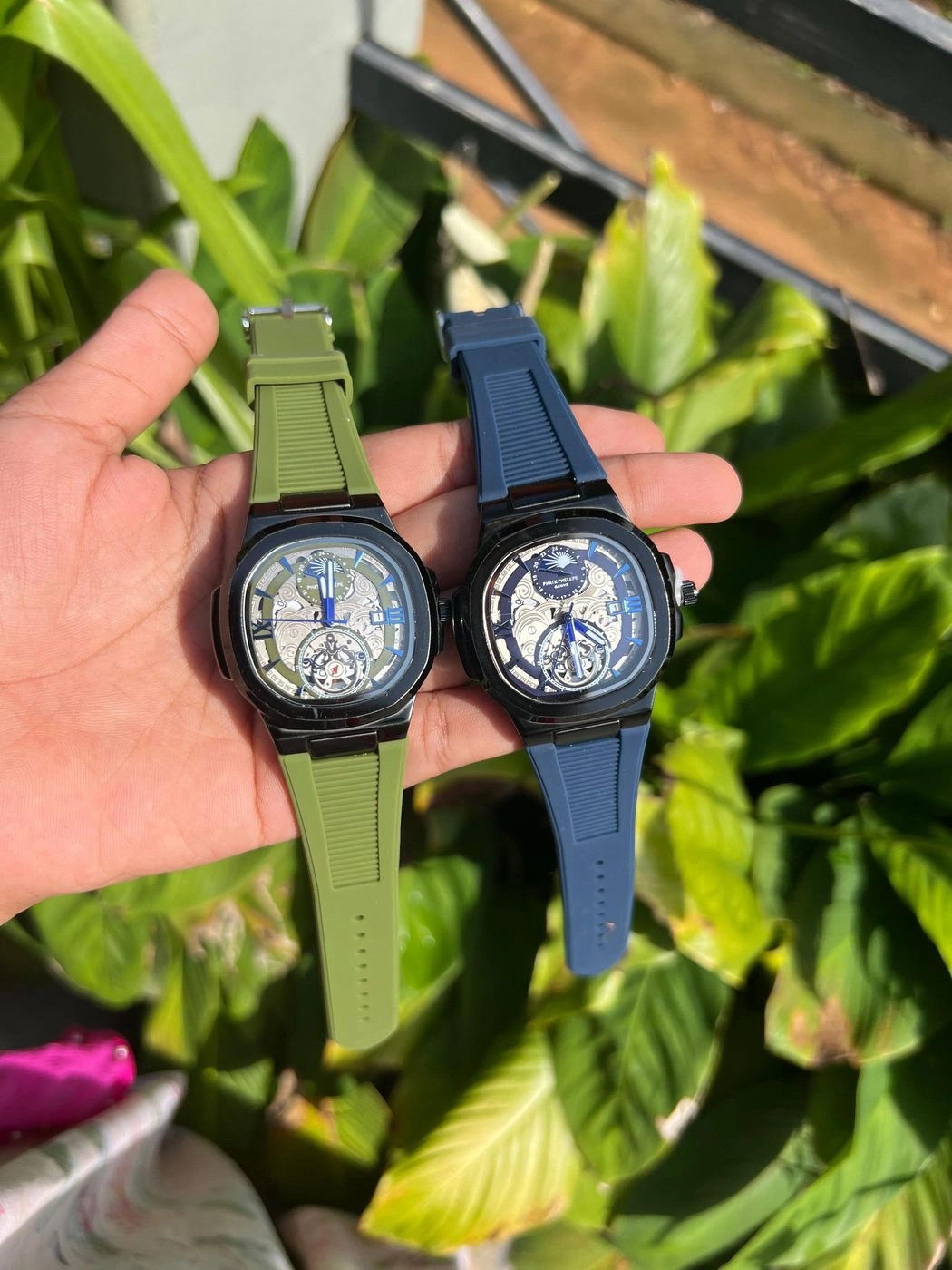Philippe Geneve automatic wristwatch with a blue rubber strap and a skeleton dial