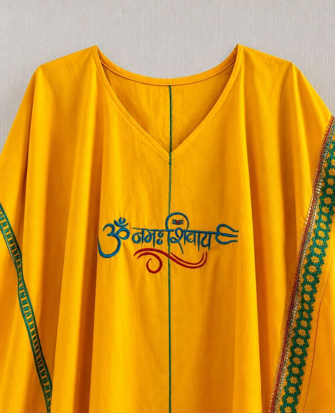 Yellow kaftan with Blue write up