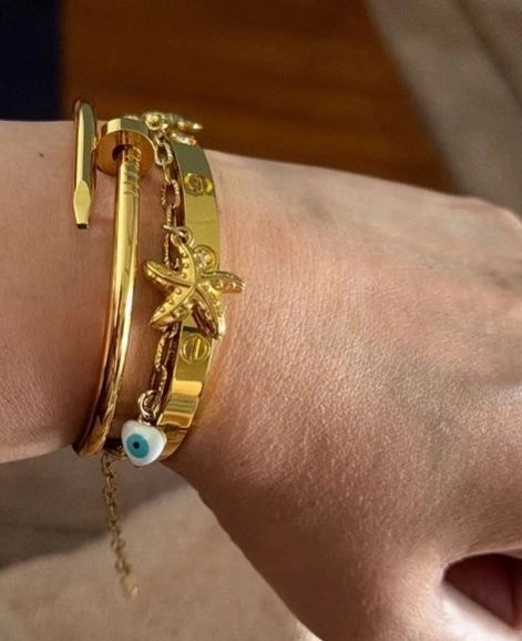 Hanging bracelets and Cartier bangles