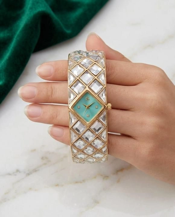 Swarrovsk_i Curiosa Bangle Gold To Tiffany 1